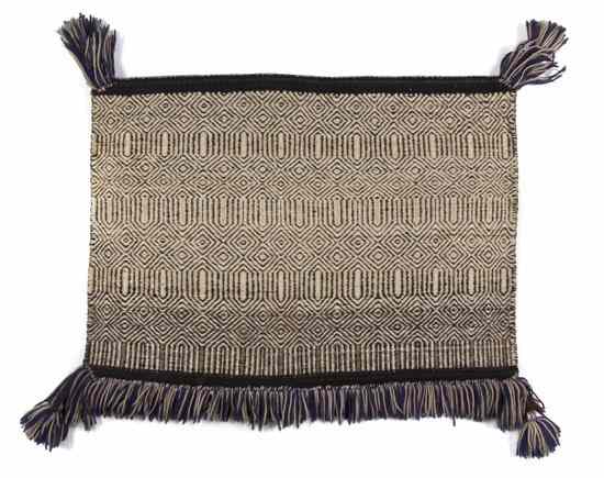 Appraisal: A Navajo Weaving twill diamond Sunday saddle blanket with Germantown