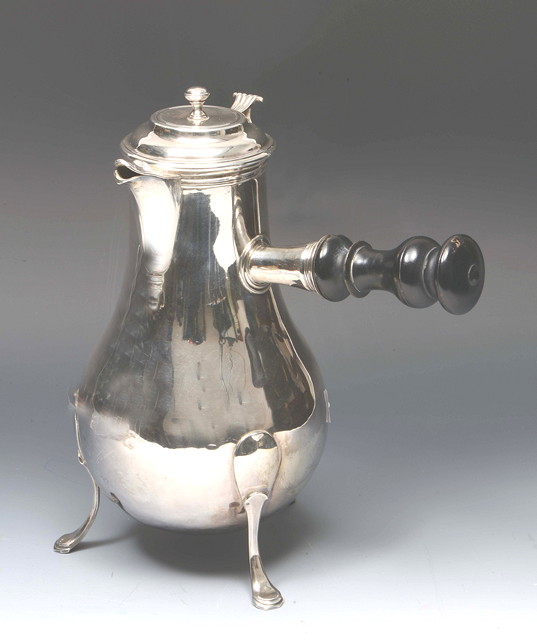 Appraisal: A DUTCH SILVER SIDE HANDLED BALUSTER COFFEE POT with hinged