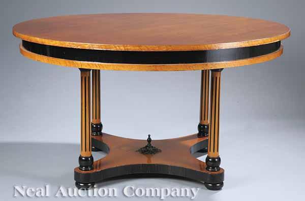 Appraisal: A Large Biedermeier-Style Maple and Ebonized Center Table circular top