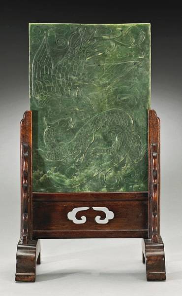 Appraisal: A 'spinach' jade rectangular plaque Carved to one side with