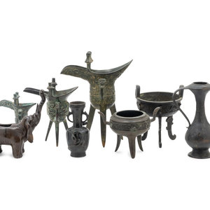 Appraisal: Eight Chinese Bronze Vessels comprising an elephant censer two vases