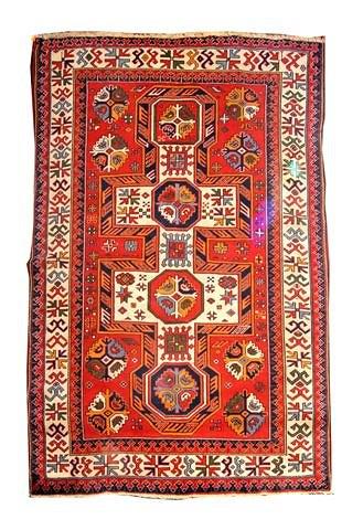 Appraisal: A TURKISH KAZAK with a traditional geometric stylised central panel