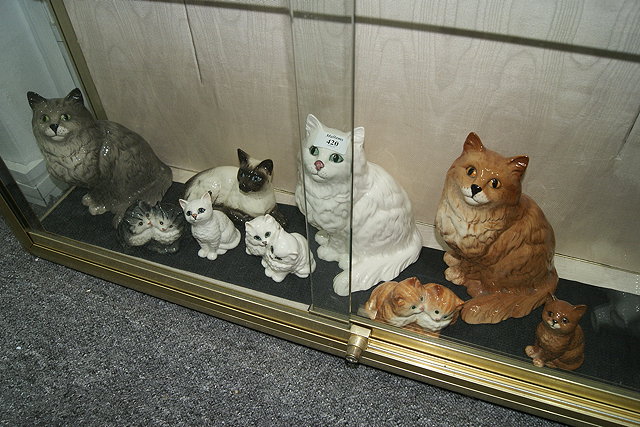 Appraisal: AN ASSORTMENT OF NINE PORCELAIN BESWICK CATS to include three