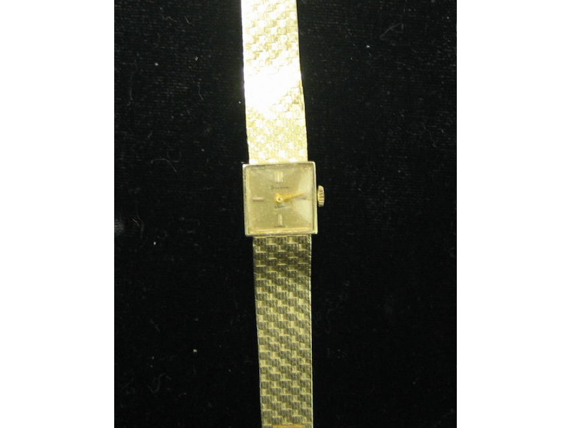 Appraisal: BULOVA WATCH Lady's k gold Bulova watch with square dial