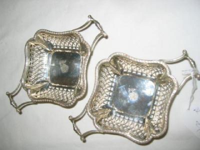 Appraisal: A PAIR OF BONBON DISHES of square form with cusped