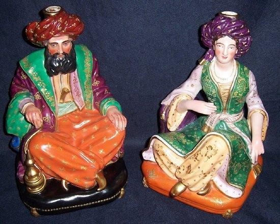 Appraisal: A pair of Paris porcelain figural candlesticks modelled as a