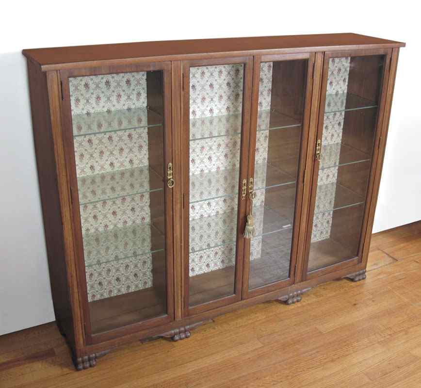 Appraisal: FOUR DOOR BOOKCASE CABINET Four glass doors interior with glass