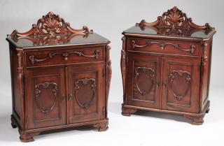 Appraisal: Rococo style carved mahogany side cabinets h Pair of carved