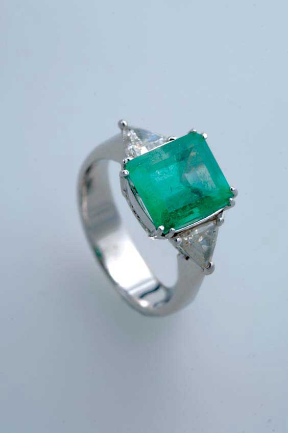 Appraisal: EMERALD DIAMOND AND K GOLD RING Emerald diamond and K