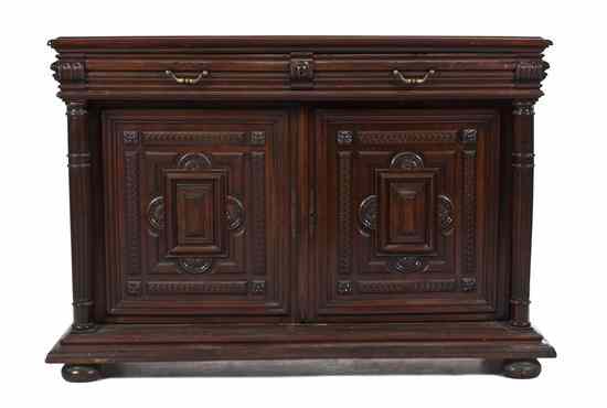 Appraisal: A Continental Mahogany Console Cabinet having a rectangular top over