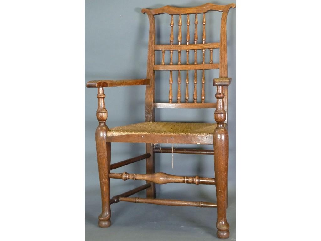 Appraisal: EARLY TH CENTURY OAK REPRODUCTION SPINDLE BACK RUSH SEAT 'LANCASHIRE'