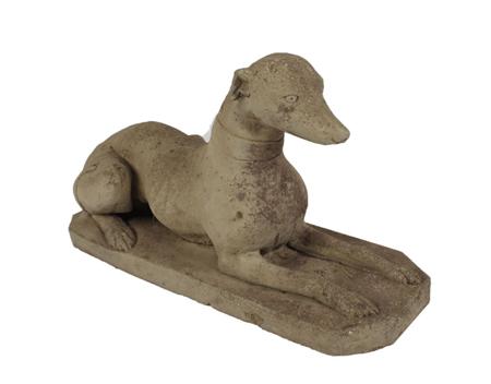 Appraisal: COMPOSITION STONE MODEL OF A GREYHOUND the recumbent dog raised