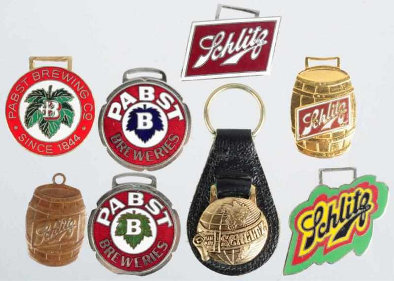 Appraisal: Lot of Schlitz Pabst Beer Fobs The Pabst fobs are