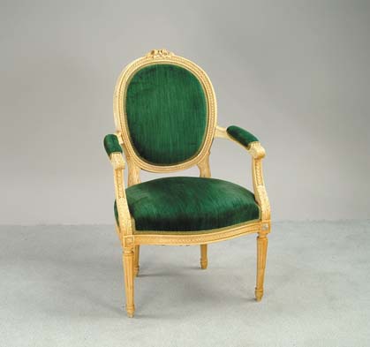 Appraisal: FRENCH PROVINCIAL STYLE UPHOLSTERED ARMCHAIR Nice quality with good carved