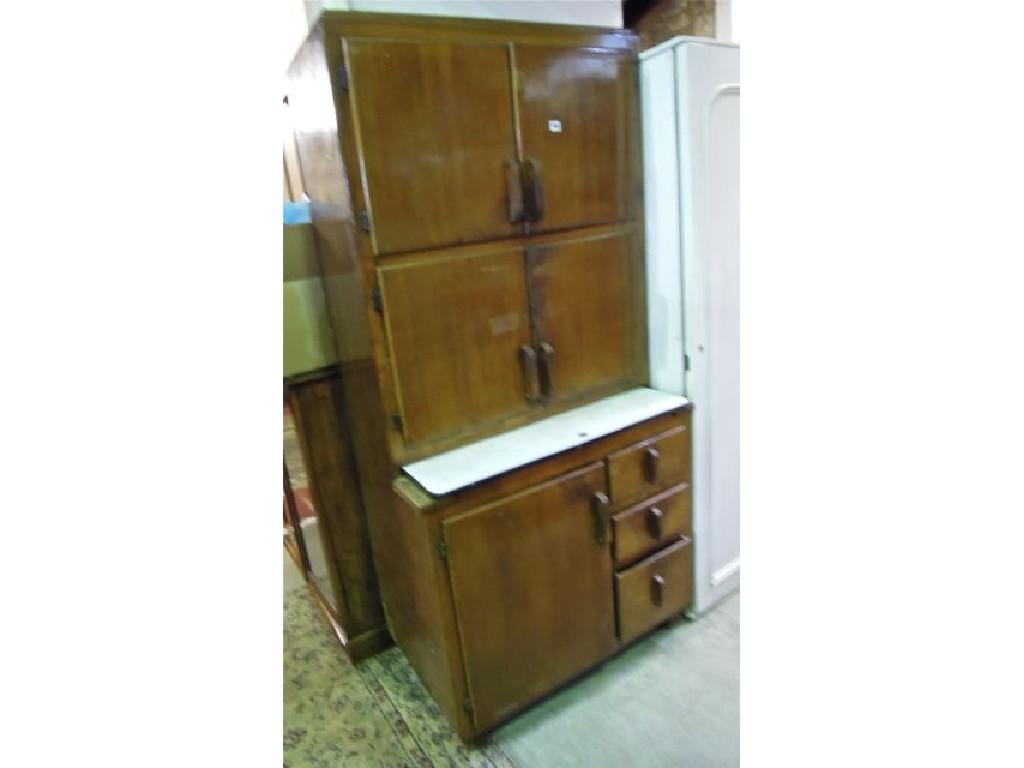 Appraisal: A vintage oak framed kitchen cabinet enclosed by an arrangement