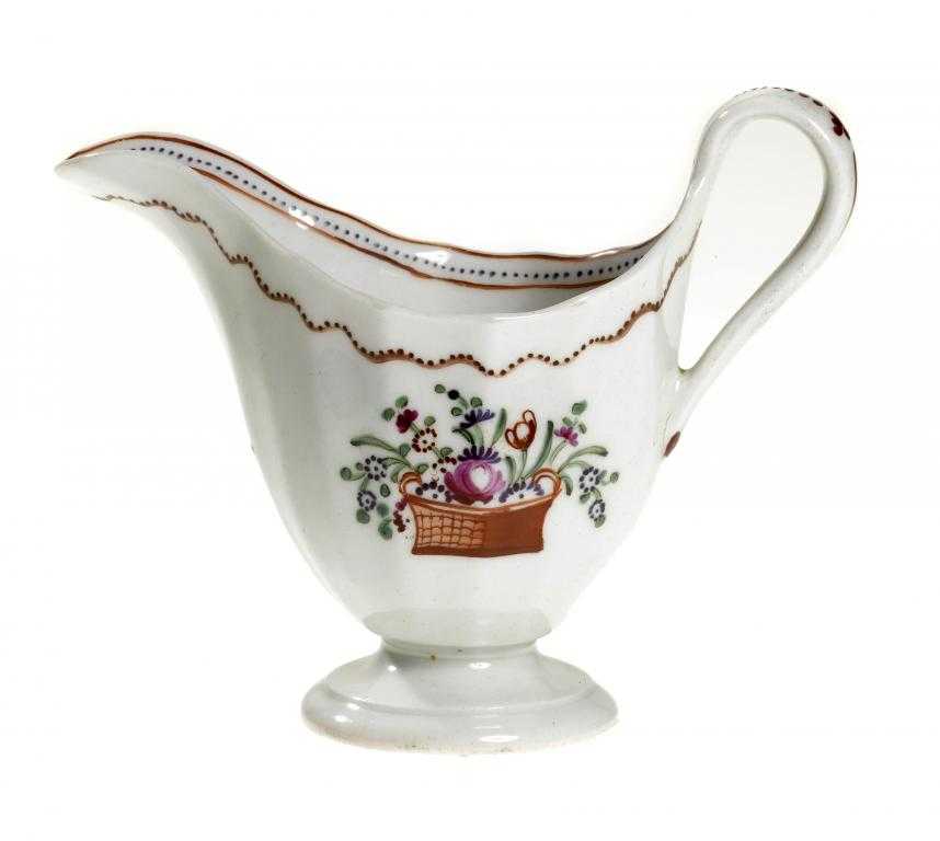 Appraisal: A NEW HALL CREAM JUG pattern of fluted helmet shape