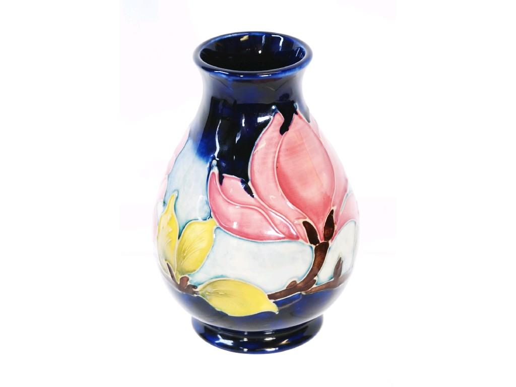 Appraisal: SMALL WALTER MOORCROFT POTTERY BALUSTER SHAPE VASE decorated with flowering