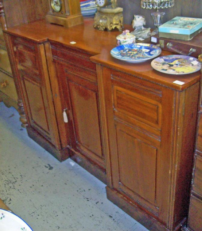 Appraisal: A Victorian walnut sideboard -