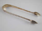 Appraisal: A pair of Irish silver bright cut sugar tongs Dublin