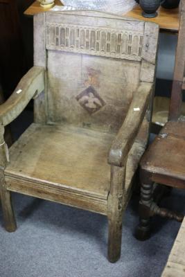 Appraisal: A th Century oak armchair the back with band of