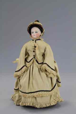 Appraisal: PETITE FRENCH FASHION ATTRIBUTED TO GAUTHIER Unmarked bisque socket head