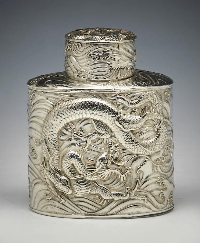 Appraisal: Chinese oval tea caddy decorated with dragons Chinese oval tea