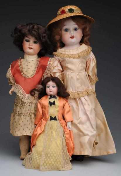 Appraisal: Lot of Bisque Dolls German bisque girl with crossed swords