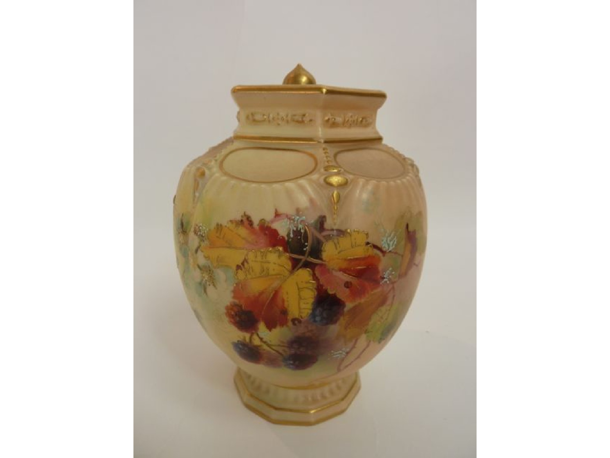 Appraisal: A Royal Worcester blush ivory vase and cover of ovoid