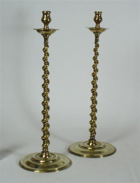 Appraisal: A pair of Regency candlesticks with gilt head ribbed columns