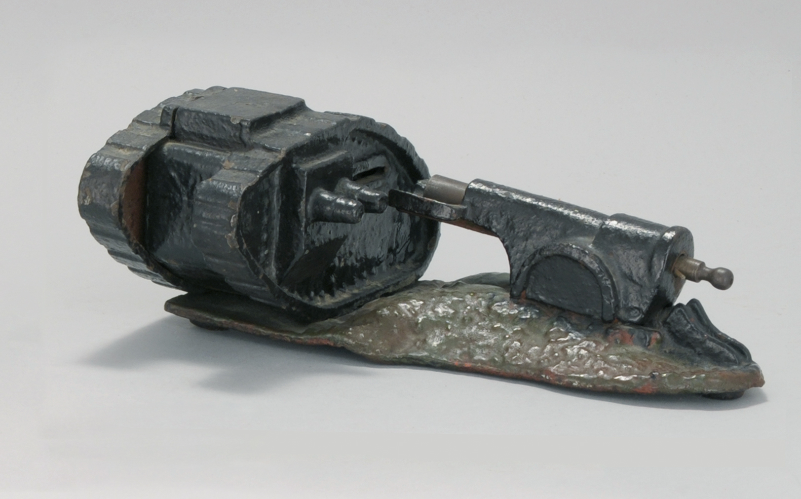 Appraisal: TANK AND CANNON CAST IRON MECHANICAL BANK Circa By Starkies