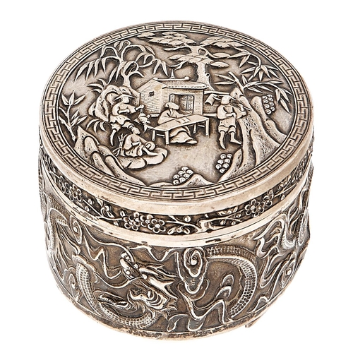 Appraisal: A Chinese cylindrical silver repousse box and cover c the