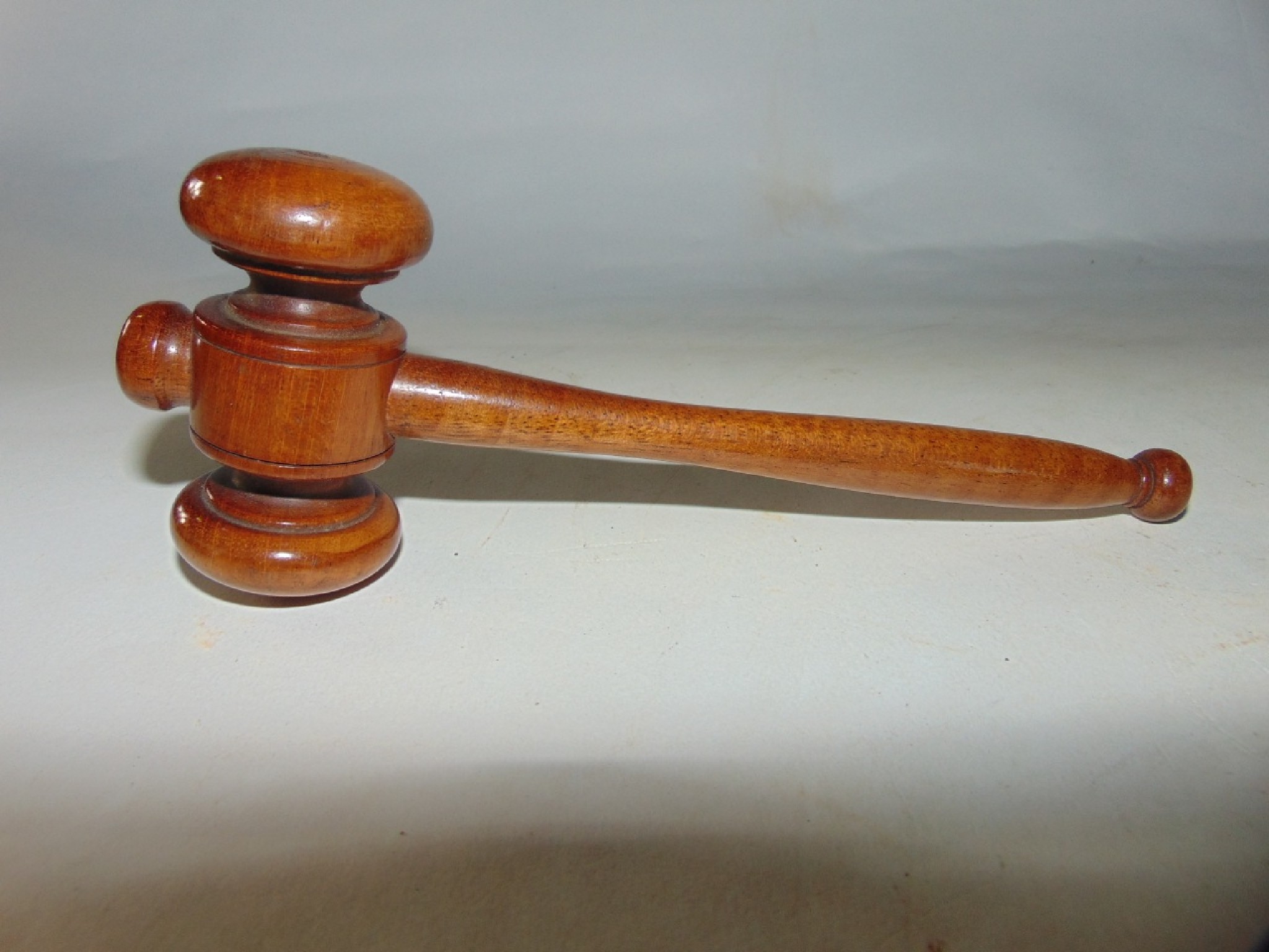 Appraisal: A simple turned timber gavel cm long approx