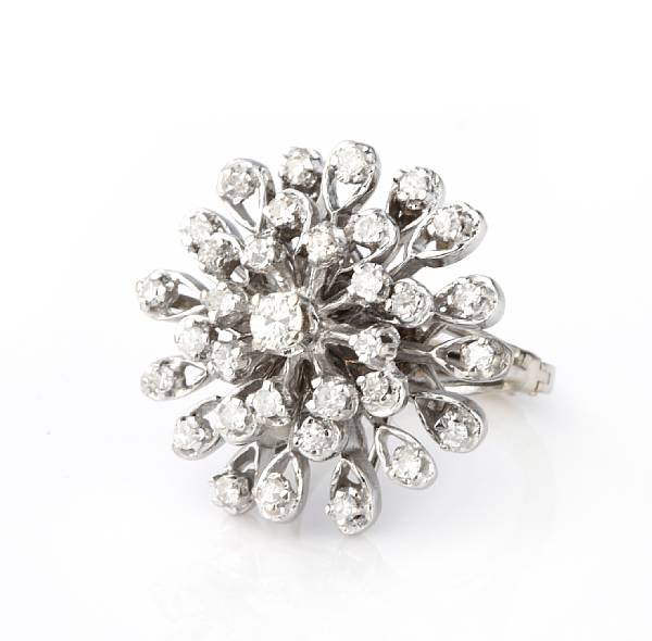 Appraisal: A diamond and k white gold cluster ring with adjustable