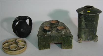 Appraisal: Chinese archaic-form pottery assortment Comprising green-glazed tripod granary glazed three-burner