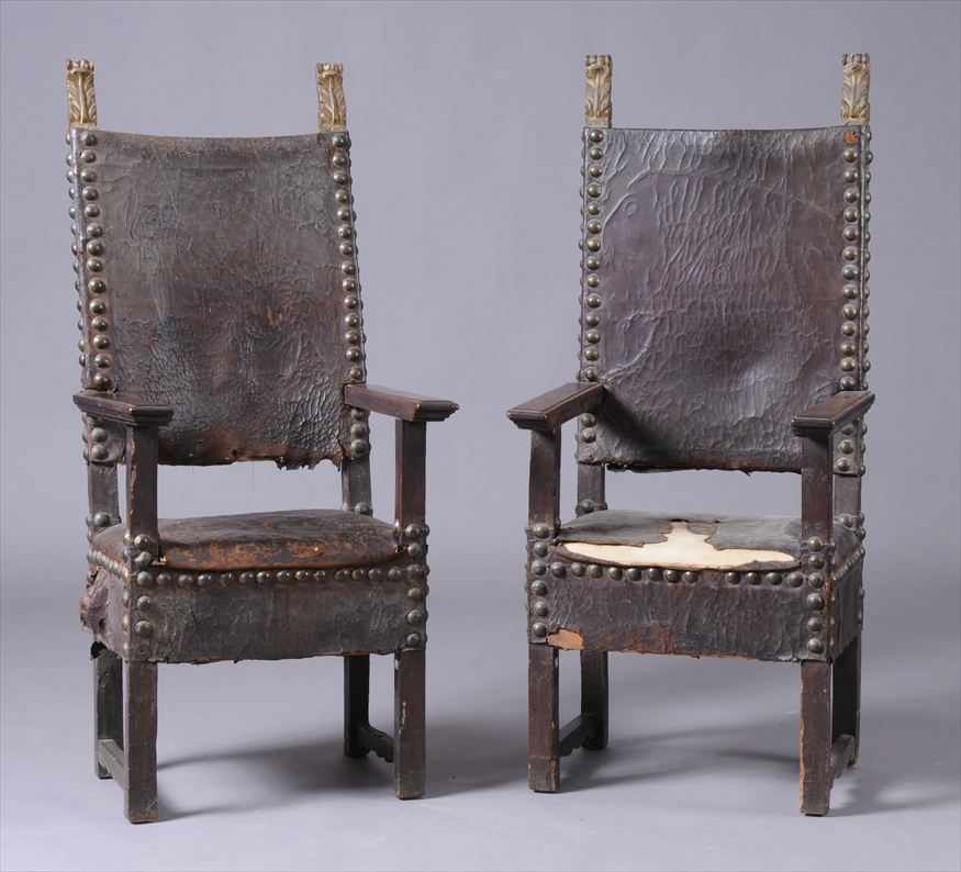 Appraisal: ASSEMBLED PAIR OF ITALIAN BAROQUE CARVED WALNUT AND PARCEL-GILT ARMCHAIRS