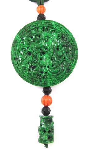 Appraisal: CHINESE CARVED CHLOROMELANITE JADEITE PENDANT SET with coral beads and