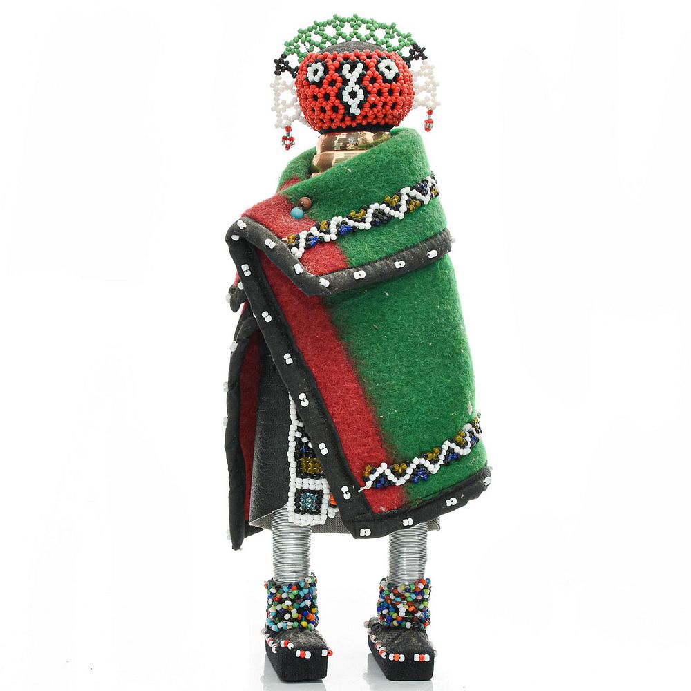 Appraisal: AFRICAN WOMAN DOLL WITH BEADED DECORATION Cloaked in African colors