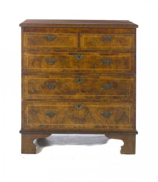 Appraisal: A WALNUT AND LINE INLAID CHEST OF DRAWERS with quarter