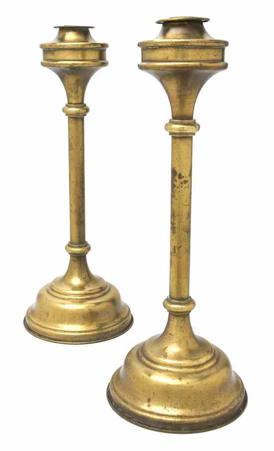 Appraisal: A Pair of Gilt Metal Candlesticks each of baluster form