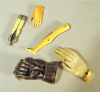 Appraisal: Group of silver and ivory novelty items Comprising an English