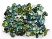 Appraisal: A quantity of loose polished green tourmaline mixed cuts parcel