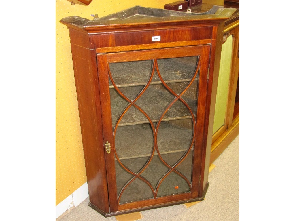 Appraisal: Georgian mahogany hanging corner cabinet