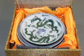 Appraisal: Three various Chinese shallow dishes decorated with dragons