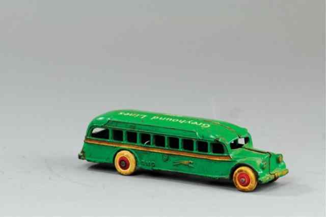 Appraisal: ARCADE GMC GREYHOUND BUS Cast iron painted in green overall