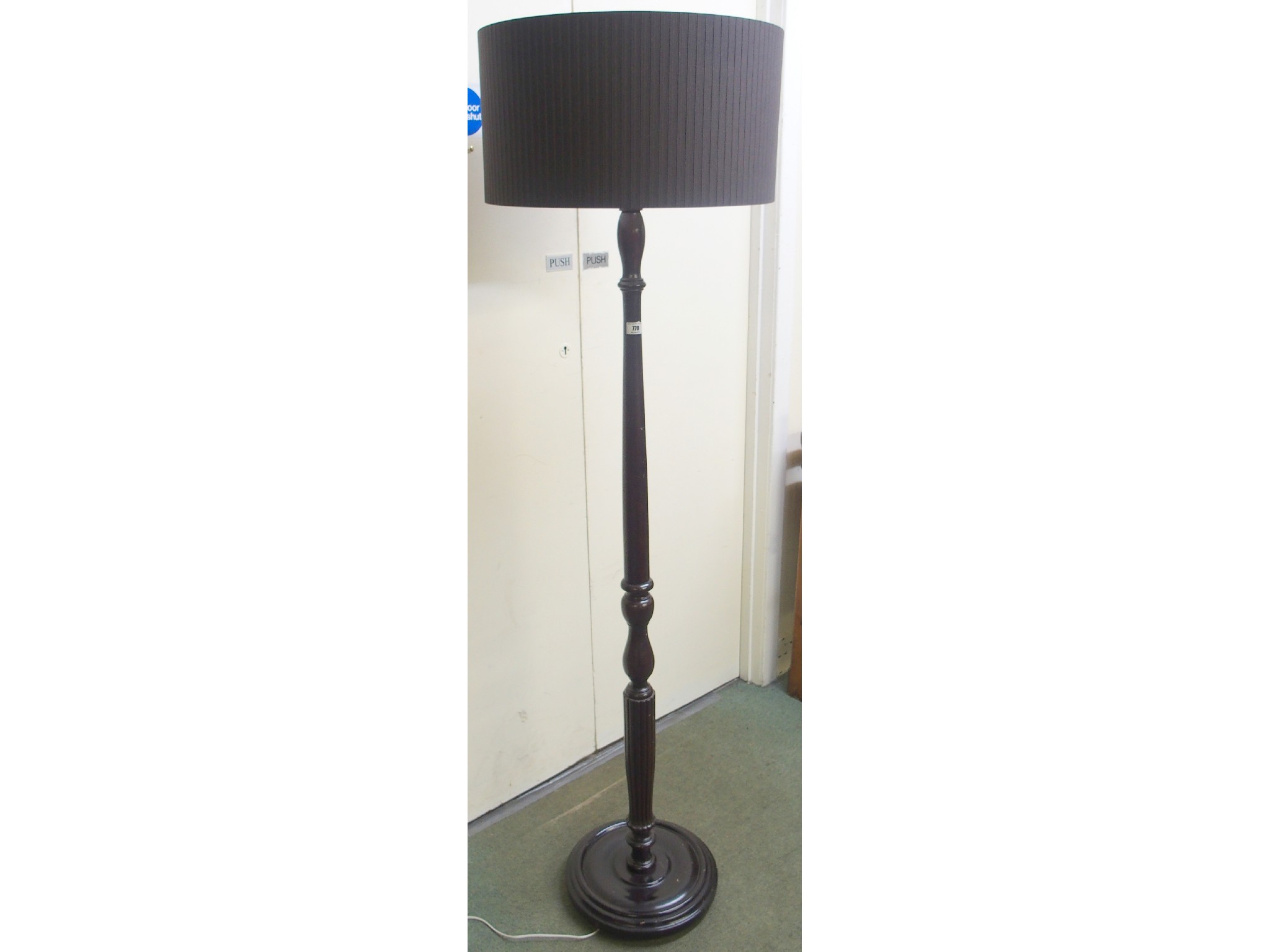 Appraisal: A mahogany standard lamp