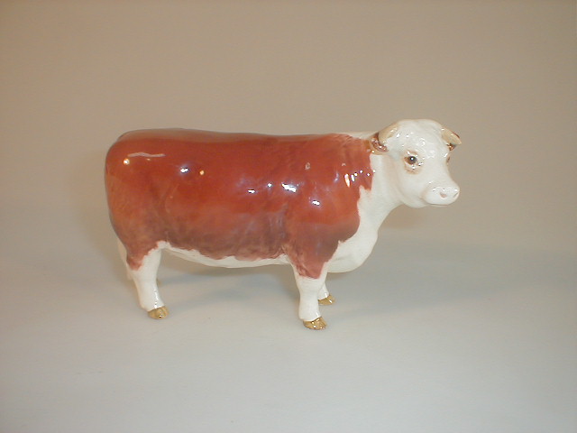 Appraisal: A Beswick champion of champions Hereford cow model no brown