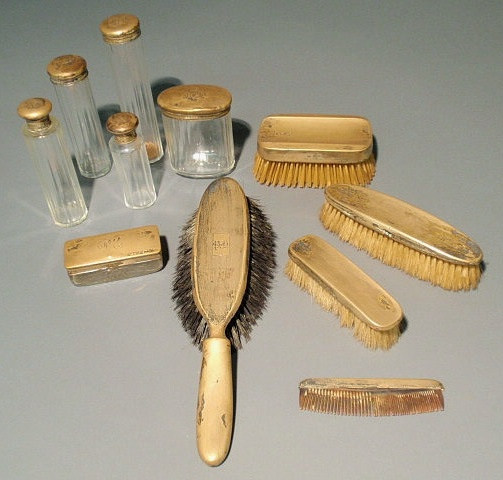 Appraisal: English silver dresser set glass bottles brushes combs etc -eleven