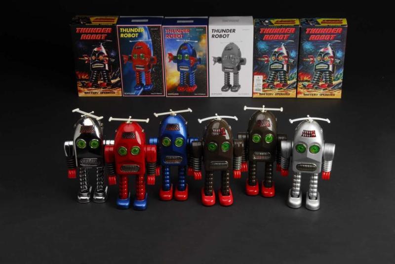 Appraisal: Lot of Tin Contemporary Thunder Robot Toys Description Includes six