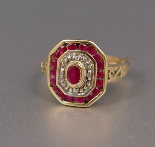 Appraisal: RUBY DIAMOND DECO RING K yellow gold ring contains one