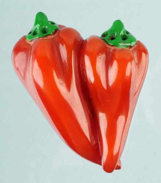 Appraisal: Vintage Bakelite Carved Chunky Peppers Brooch Description Later production Green